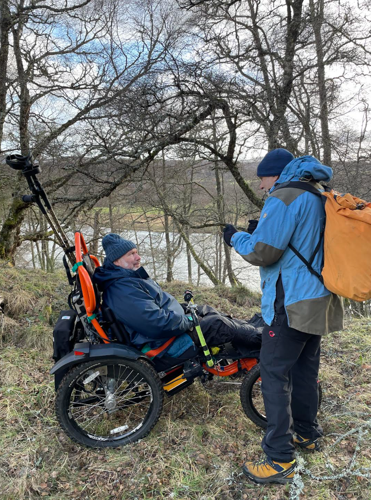 The Tarka Poncho and Apron - A Waterproof Garment Designed with Full-Time Wheelchair Users.